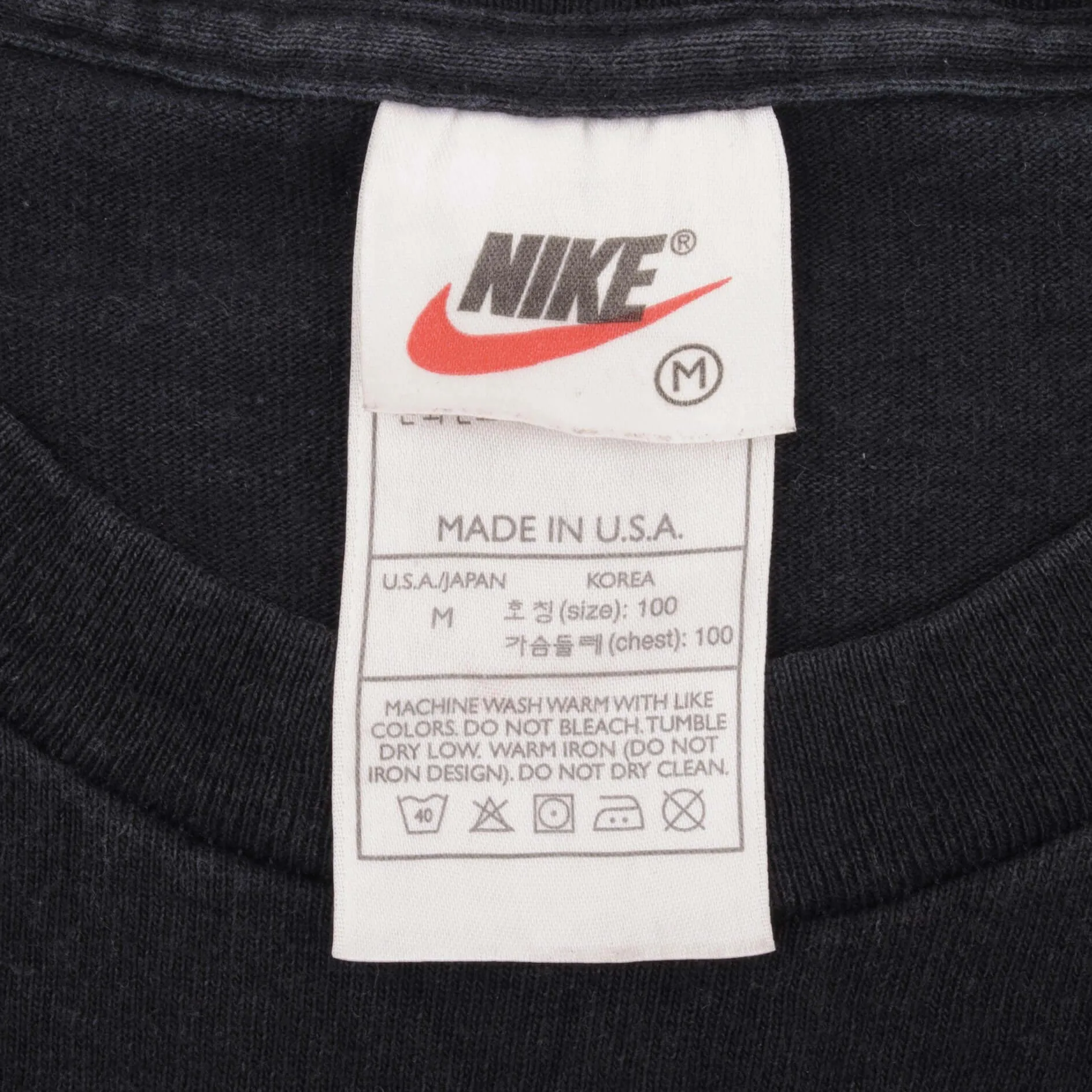 VINTAGE NIKE CLASSIC SWOOSH BLACK TEE SHIRT LATE 1990S MEDIUM MADE IN USA